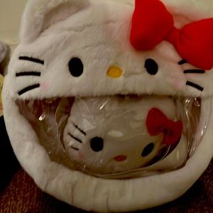 Hello kitty small shoulder bag with matching plush key chain.
